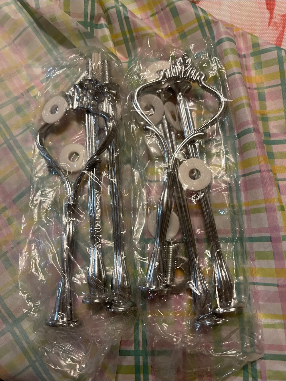 Pair of silver-colored metal tiered cake stand hardware kits